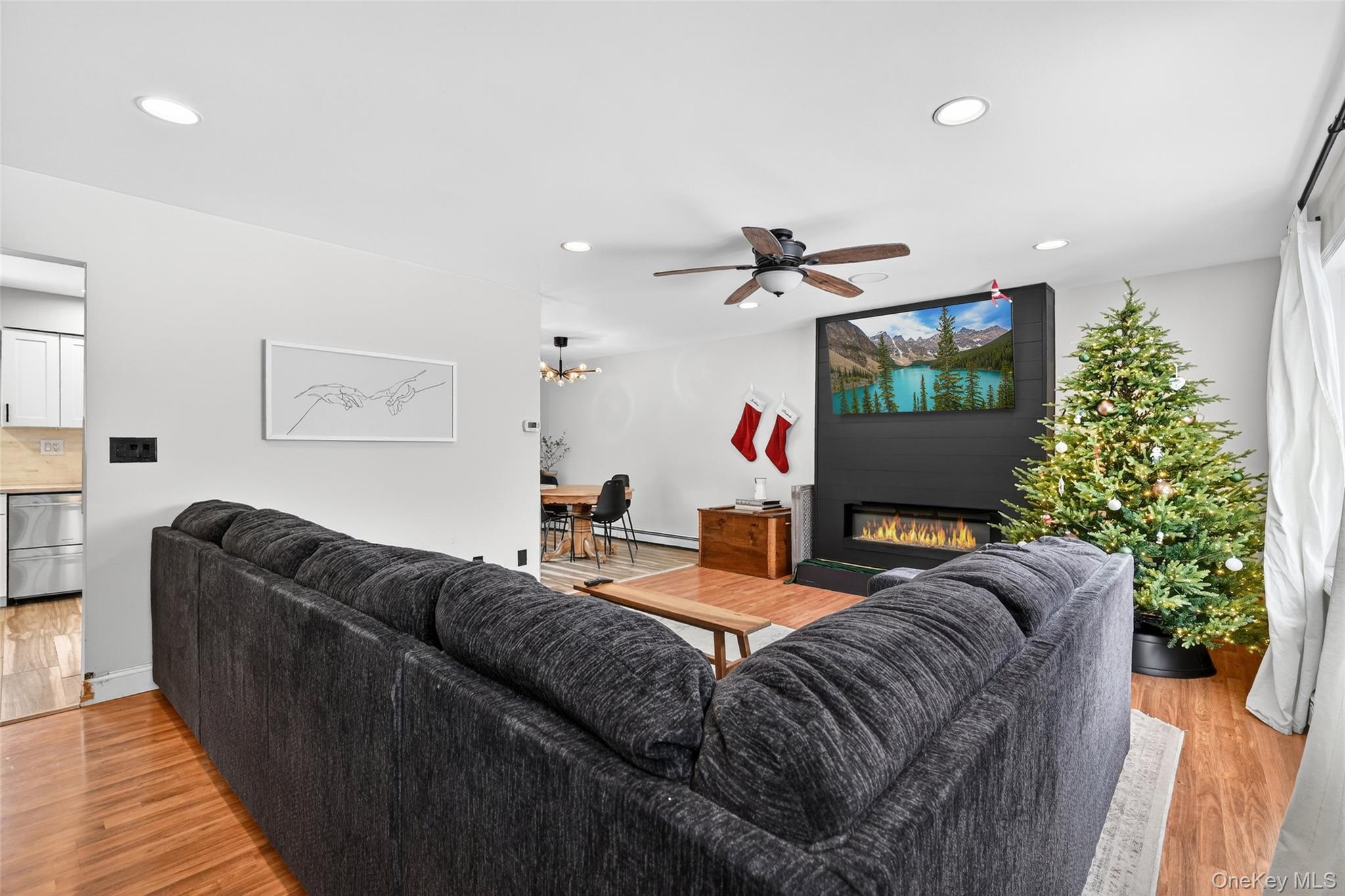 917 Scotchtown Collabar Road Middletown, NY 10941 - Photo 5 of 33 a living room with furniture and a flat screen tv
