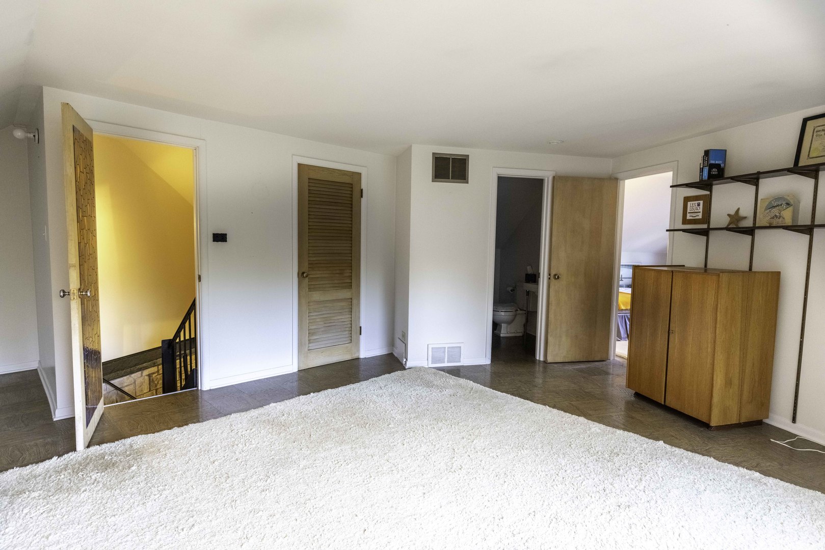 853 Cramer Court Willowbrook, IL 60527 - Photo 23 of 27 a bedroom with a bed and a mirror