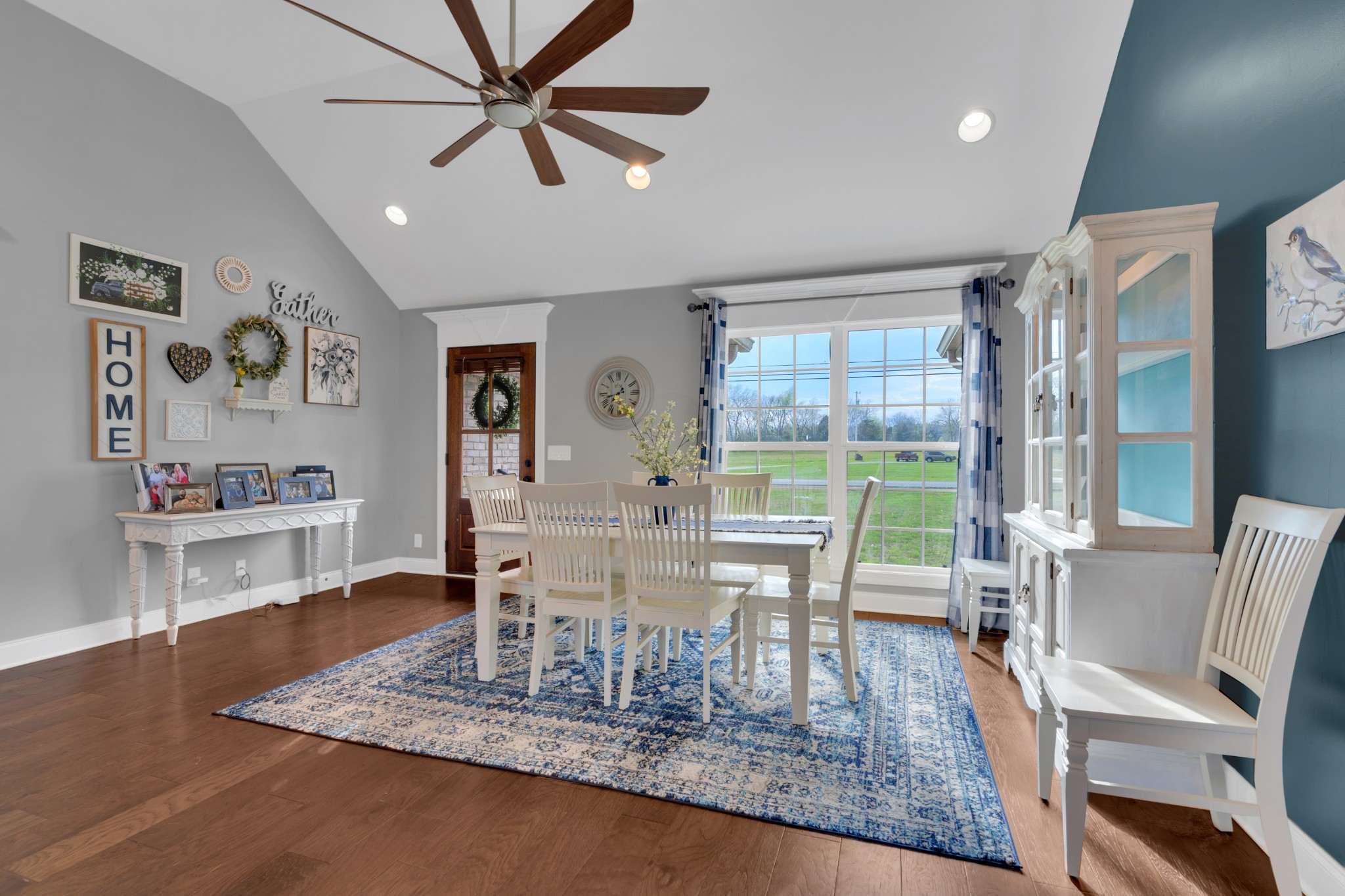 2058 Halls Mill Road Unionville, TN 37180 - Photo 23 of 67 a dining room with wooden floor and a floor to ceiling window
