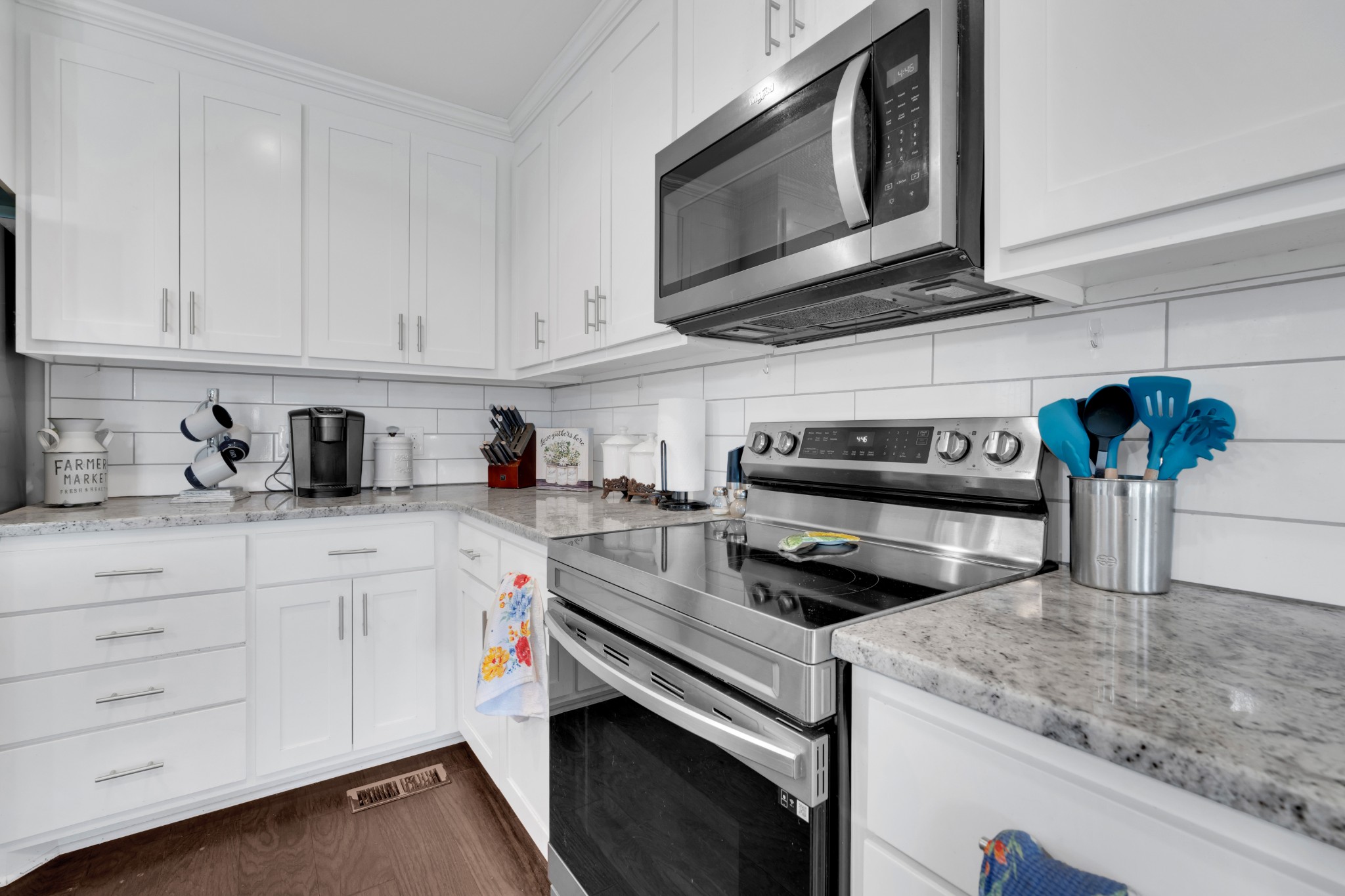 2058 Halls Mill Road Unionville, TN 37180 - Photo 28 of 67 a kitchen with stainless steel appliances granite countertop a sink a stove and cabinets
