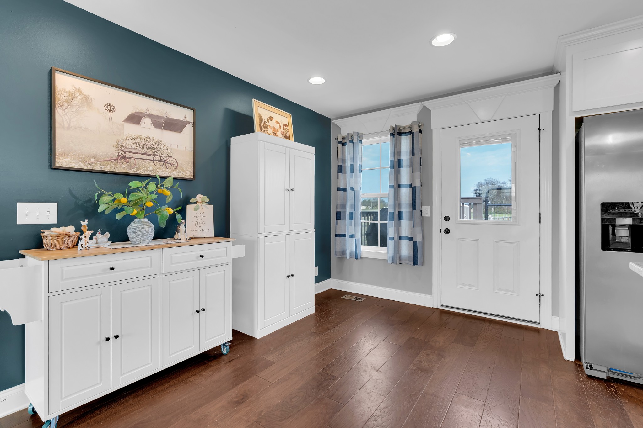 2058 Halls Mill Road Unionville, TN 37180 - Photo 31 of 67 a hallway with wooden floor and cabinet
