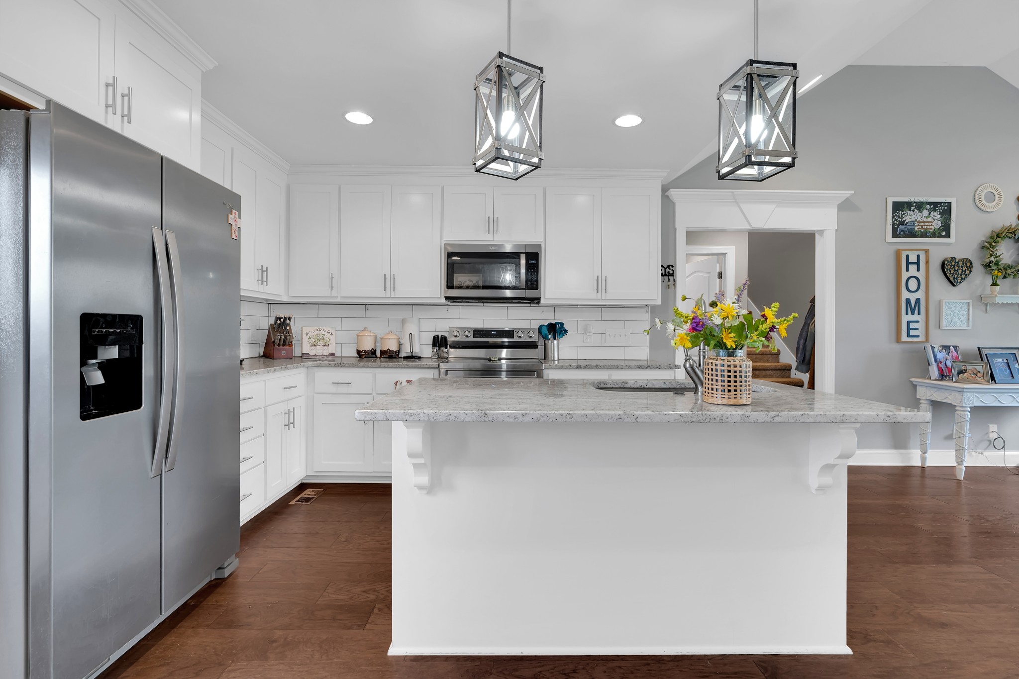 2058 Halls Mill Road Unionville, TN 37180 - Photo 33 of 67 a kitchen with stainless steel appliances granite countertop a refrigerator a stove top oven a sink and dishwasher
