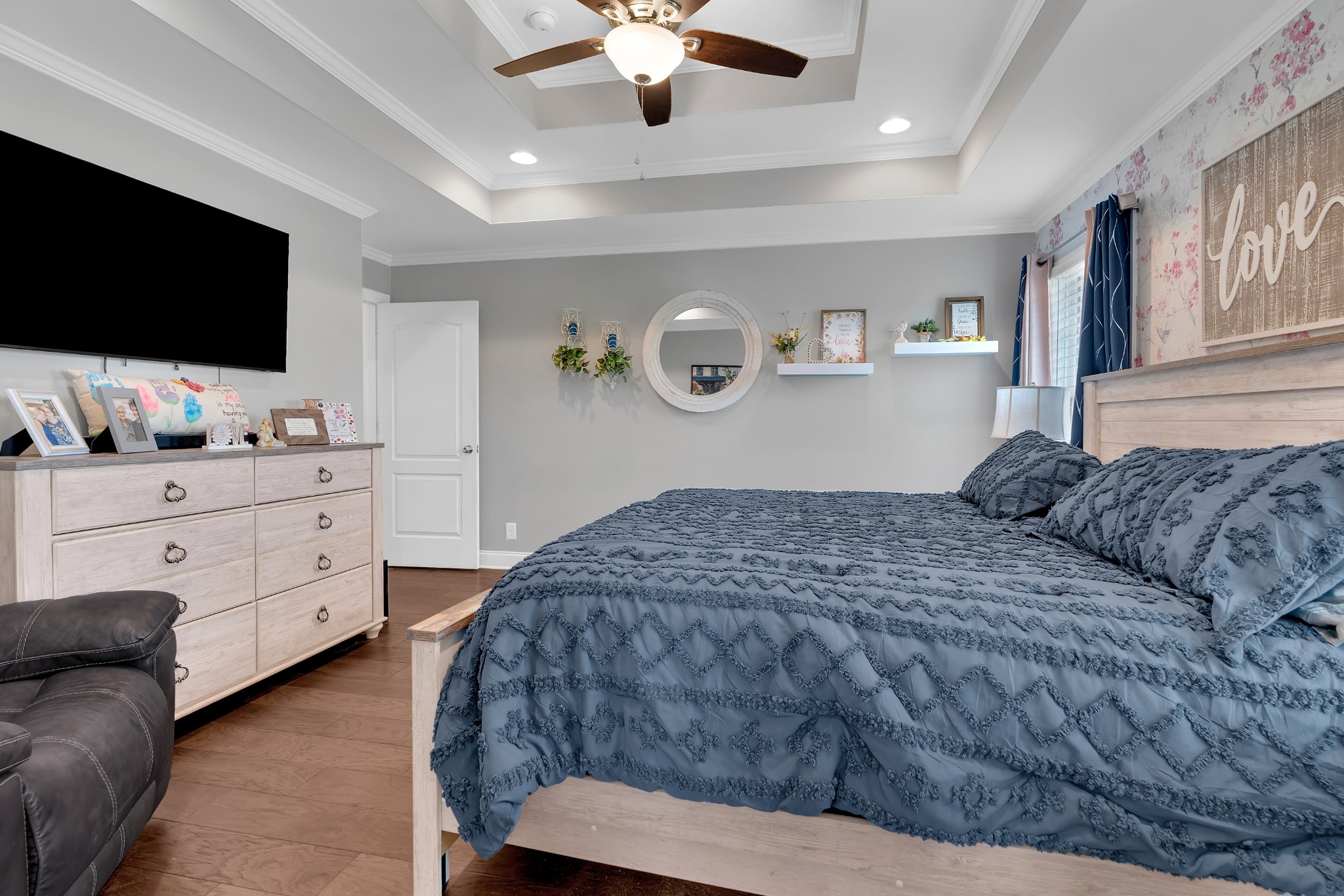 2058 Halls Mill Road Unionville, TN 37180 - Photo 39 of 67 a bedroom with a bed and a flat screen tv