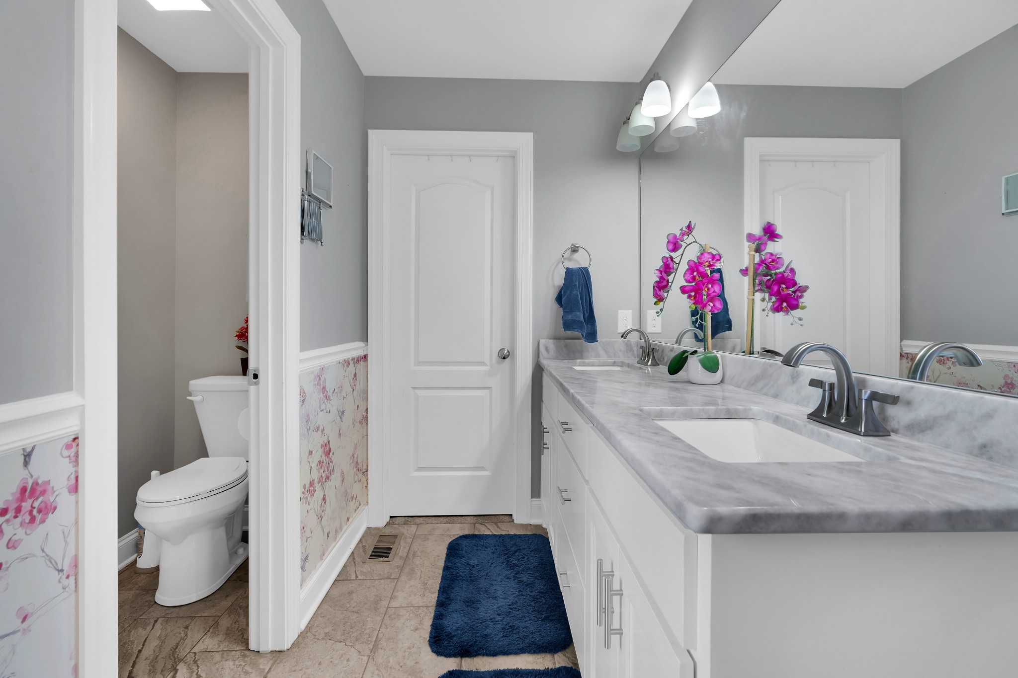 2058 Halls Mill Road Unionville, TN 37180 - Photo 40 of 67 a bathroom with a granite countertop sink a toilet and a shower