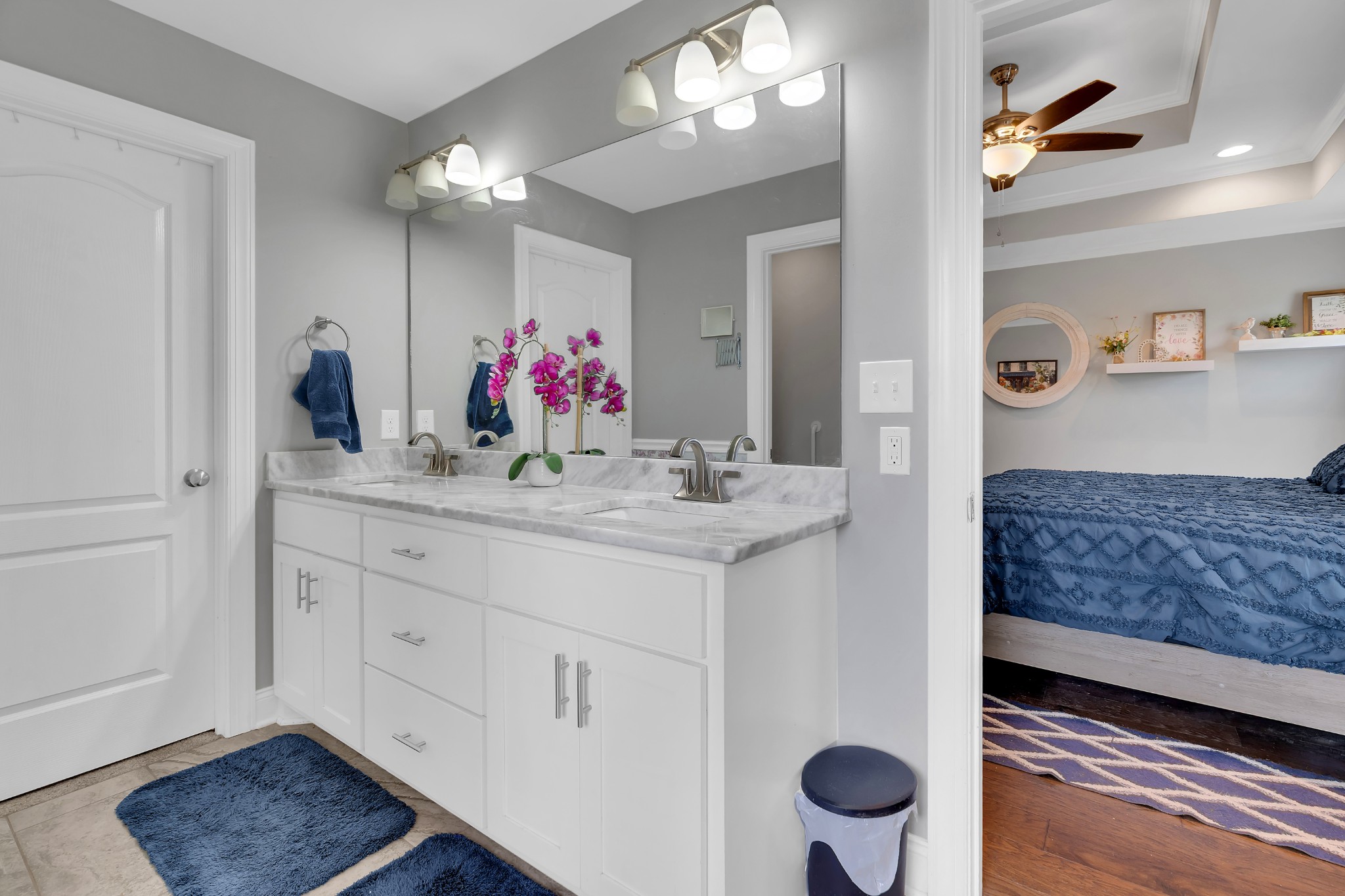 2058 Halls Mill Road Unionville, TN 37180 - Photo 41 of 67 a bathroom with a granite countertop sink a toilet a mirror and shower