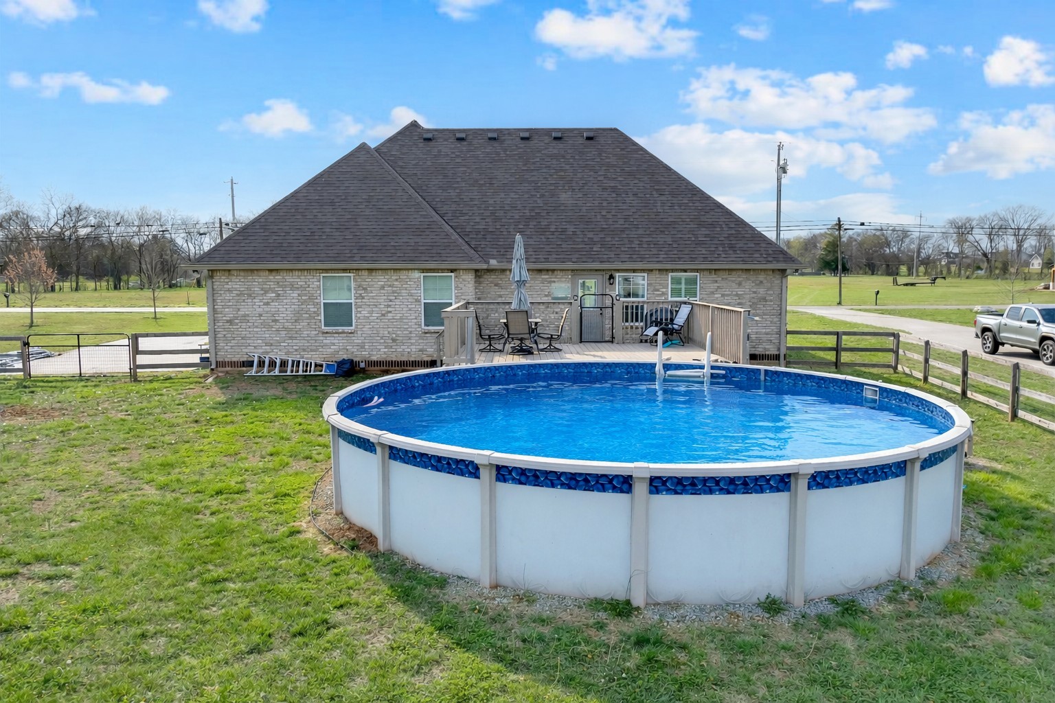 2058 Halls Mill Road Unionville, TN 37180 - Photo 55 of 67 a view of a house with a swimming pool and a yard