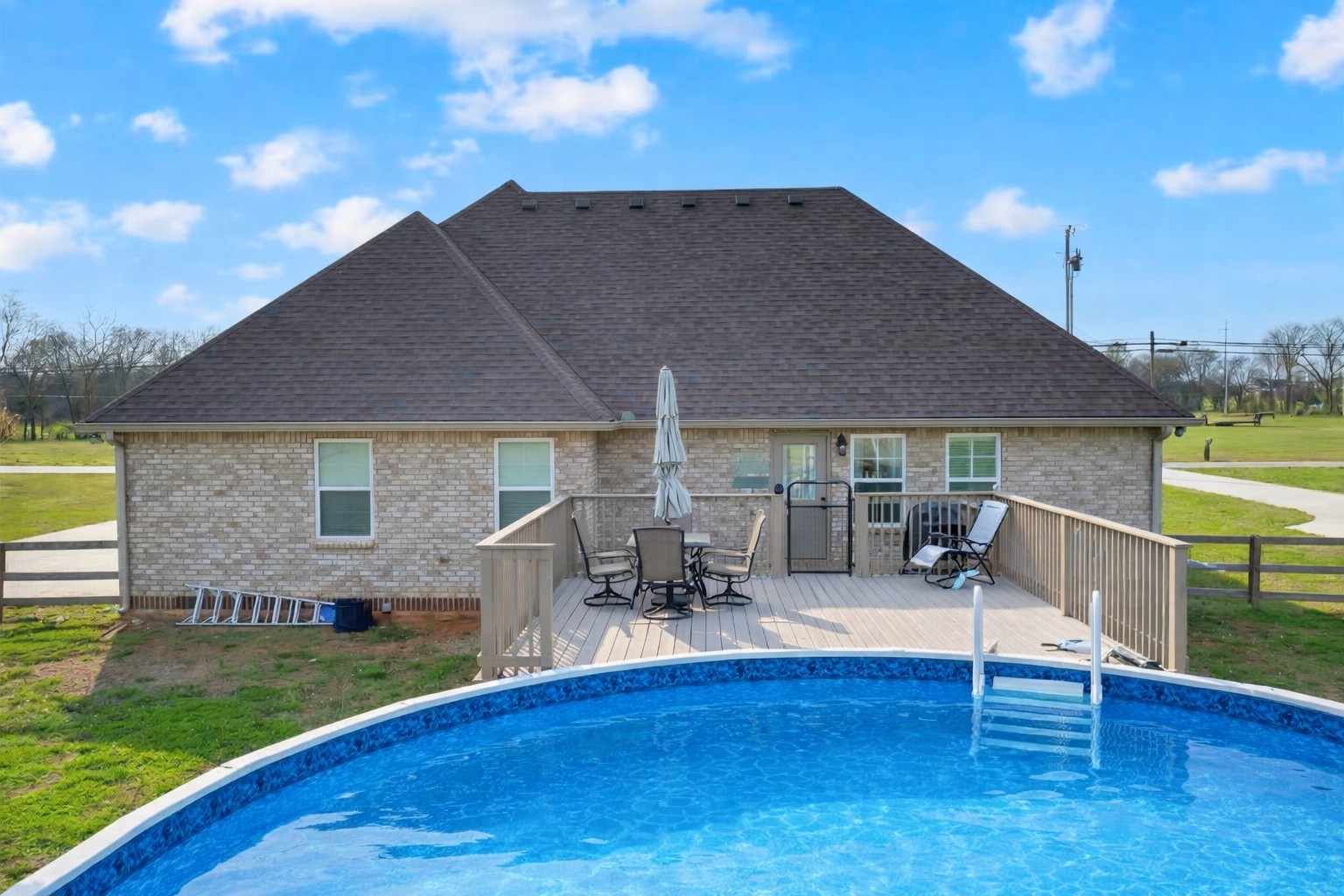 2058 Halls Mill Road Unionville, TN 37180 - Photo 56 of 67 a view of a house with swimming pool and sitting area
