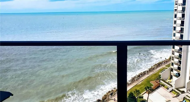 a view of a room with a large window