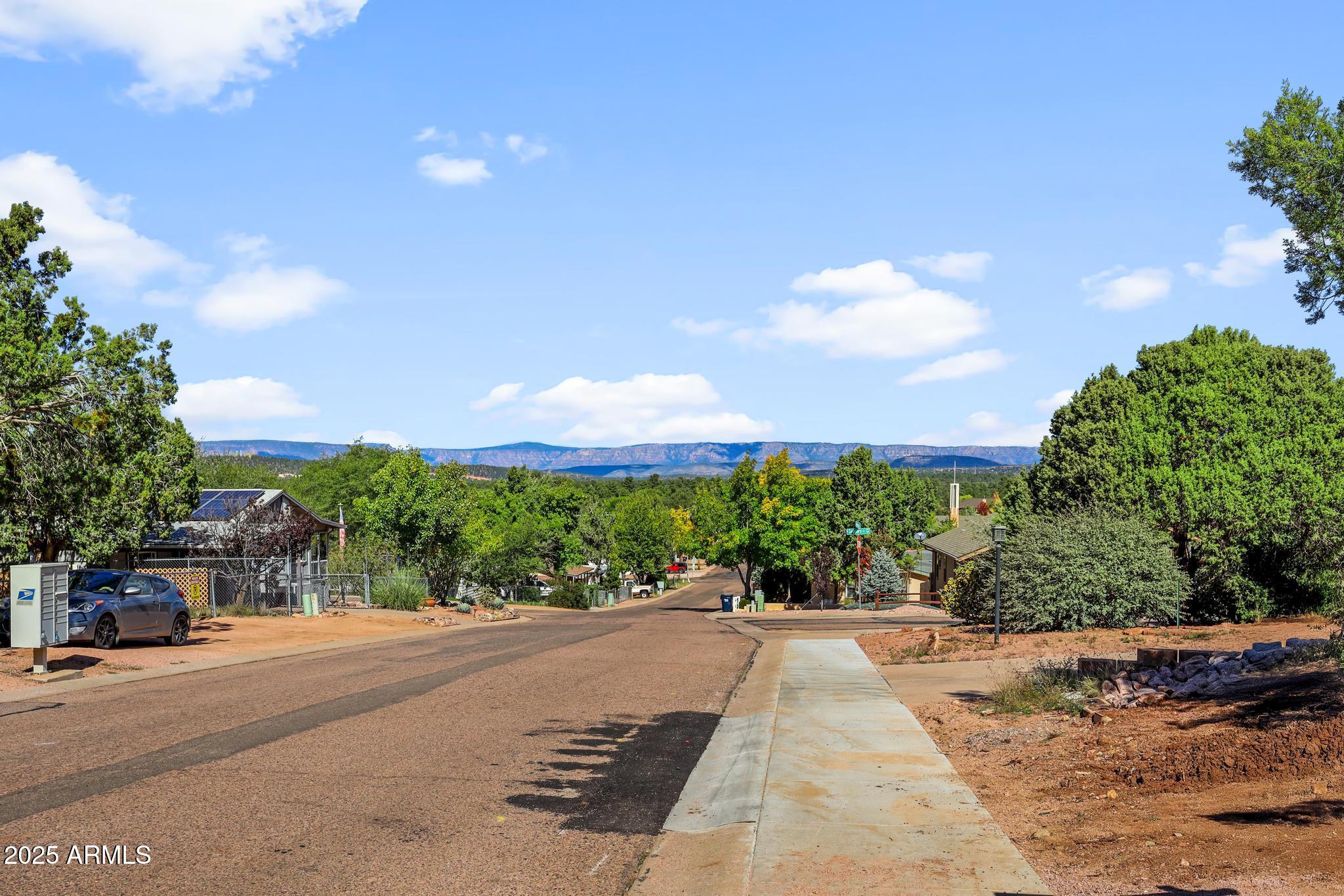 1019 South Ponderosa Street Payson, AZ 85541 - Photo 32 of 34 a view of a street with a building in the background
