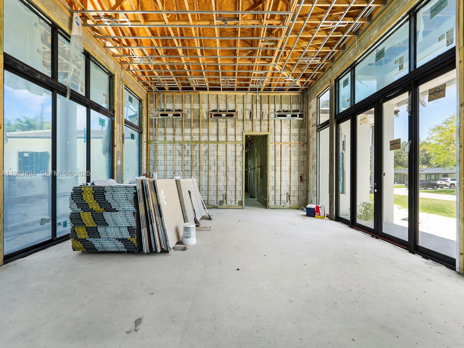 8275 Southwest 93rd Street Miami, FL 33156 - Photo 16 of 47 a view of an empty room with a balcony