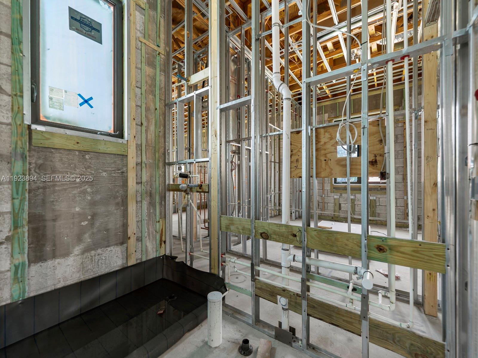 8275 Southwest 93rd Street Miami, FL 33156 - Photo 31 of 47 a bathroom with a bathtub and shower