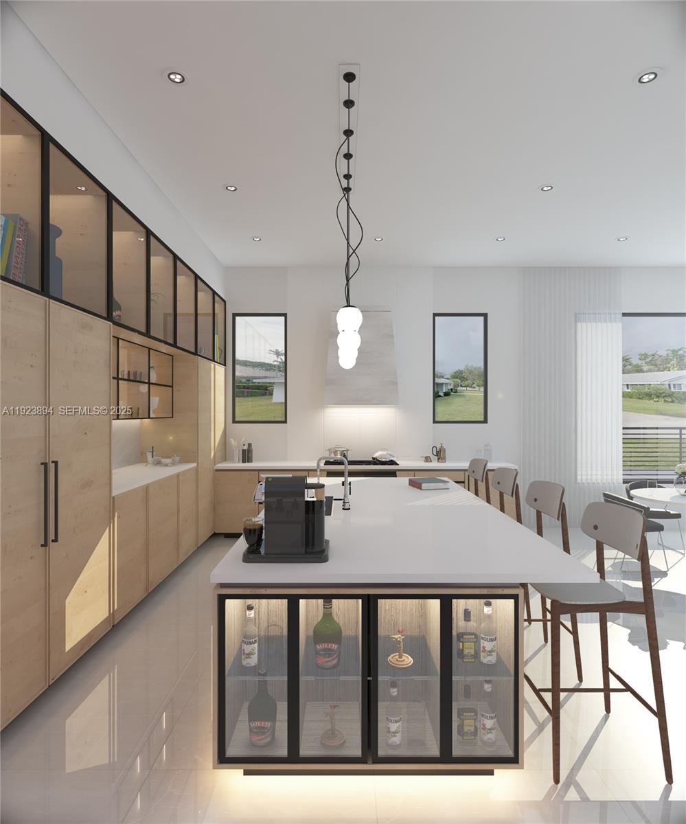 8275 Southwest 93rd Street Miami, FL 33156 - Photo 47 of 47 a kitchen that has a table chairs in it and wooden floors