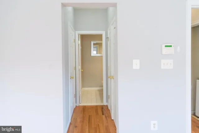 a bathroom with a sink a toilet and shower curtain