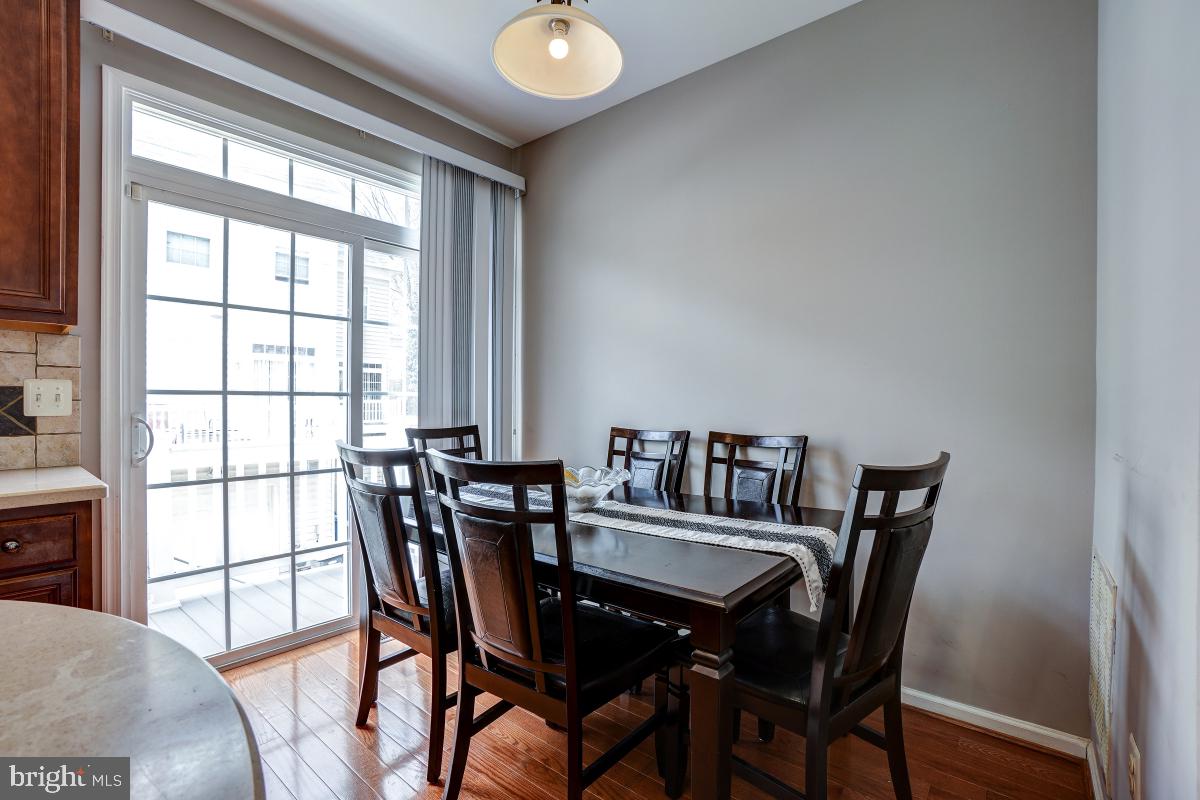 4281 South Capitol Street Southwest Washington, DC 20032 - Photo 41 of 71 a view of a dining room with furniture and window