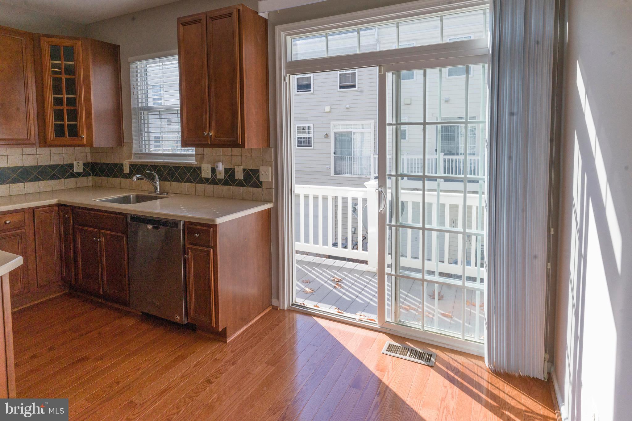 4281 South Capitol Street Southwest Washington, DC 20032 - Photo 10 of 71 a view of a kitchen with a sink and a large window