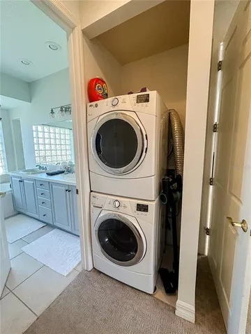 a bathroom with a toilet sink and shower