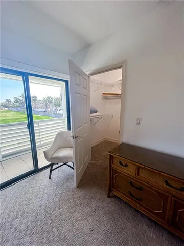 a room with furniture and window