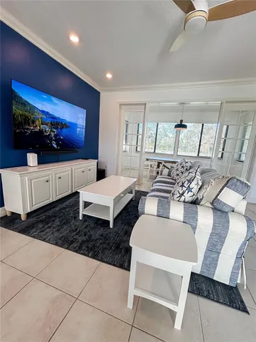 a kitchen with stainless steel appliances granite countertop a stove top oven microwave and cabinets