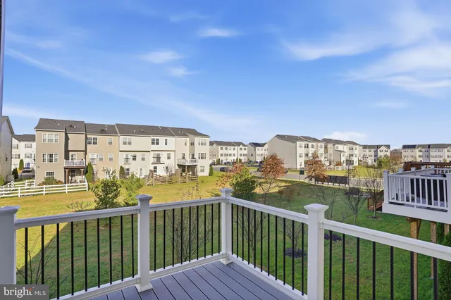 a view of a balcony with city view