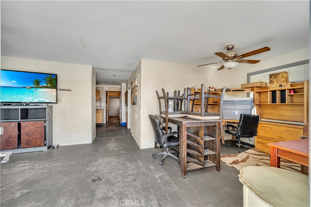 26447 Twenty Mule Team Road Boron, CA 93516 - Photo 29 of 61 a dining room with furniture and a ceiling fan