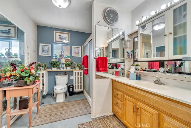 a view of a backyard with a patio and outdoor seating