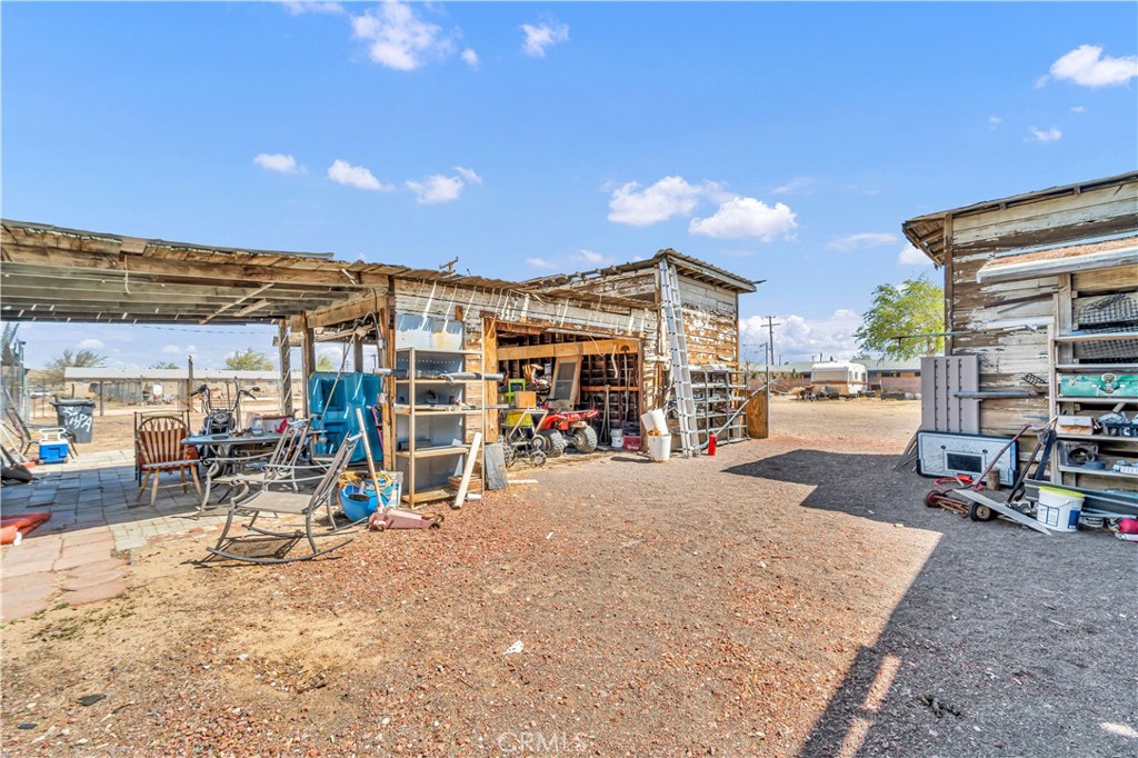 26447 Twenty Mule Team Road Boron, CA 93516 - Photo 7 of 61 a view of a house with gym equipment