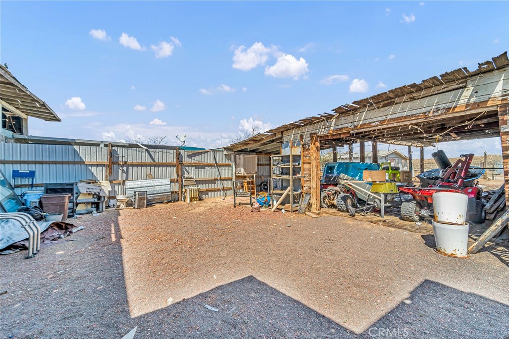 26447 Twenty Mule Team Road Boron, CA 93516 - Photo 8 of 61 a view of a chairs and tables in patio