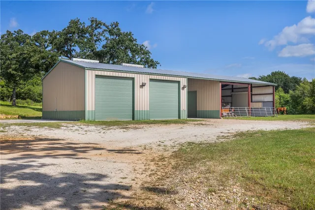 a bedroom with furniture and a potted plant