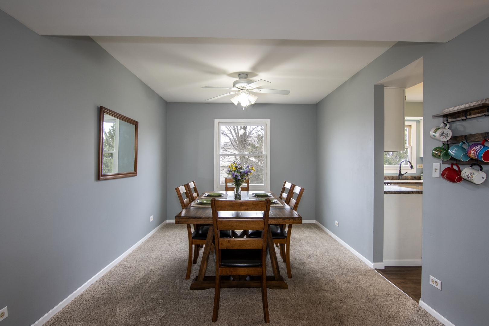 619 Chatham Circle Algonquin, IL 60102 - Photo 11 of 37 a dining room with furniture a chandelier and window