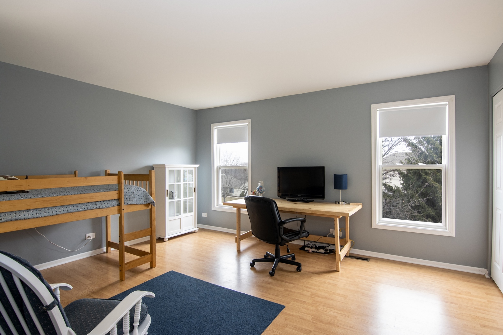 619 Chatham Circle Algonquin, IL 60102 - Photo 23 of 37 a view of a livingroom with workspace and a window