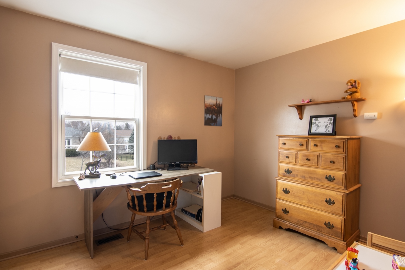 619 Chatham Circle Algonquin, IL 60102 - Photo 27 of 37 a workspace with furniture and a window