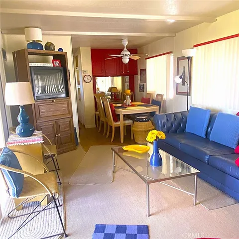 a living room with a couch and a table