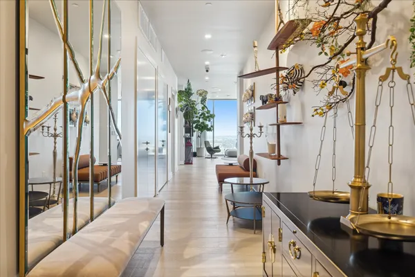 a kitchen with stainless steel appliances granite countertop sink table and chairs