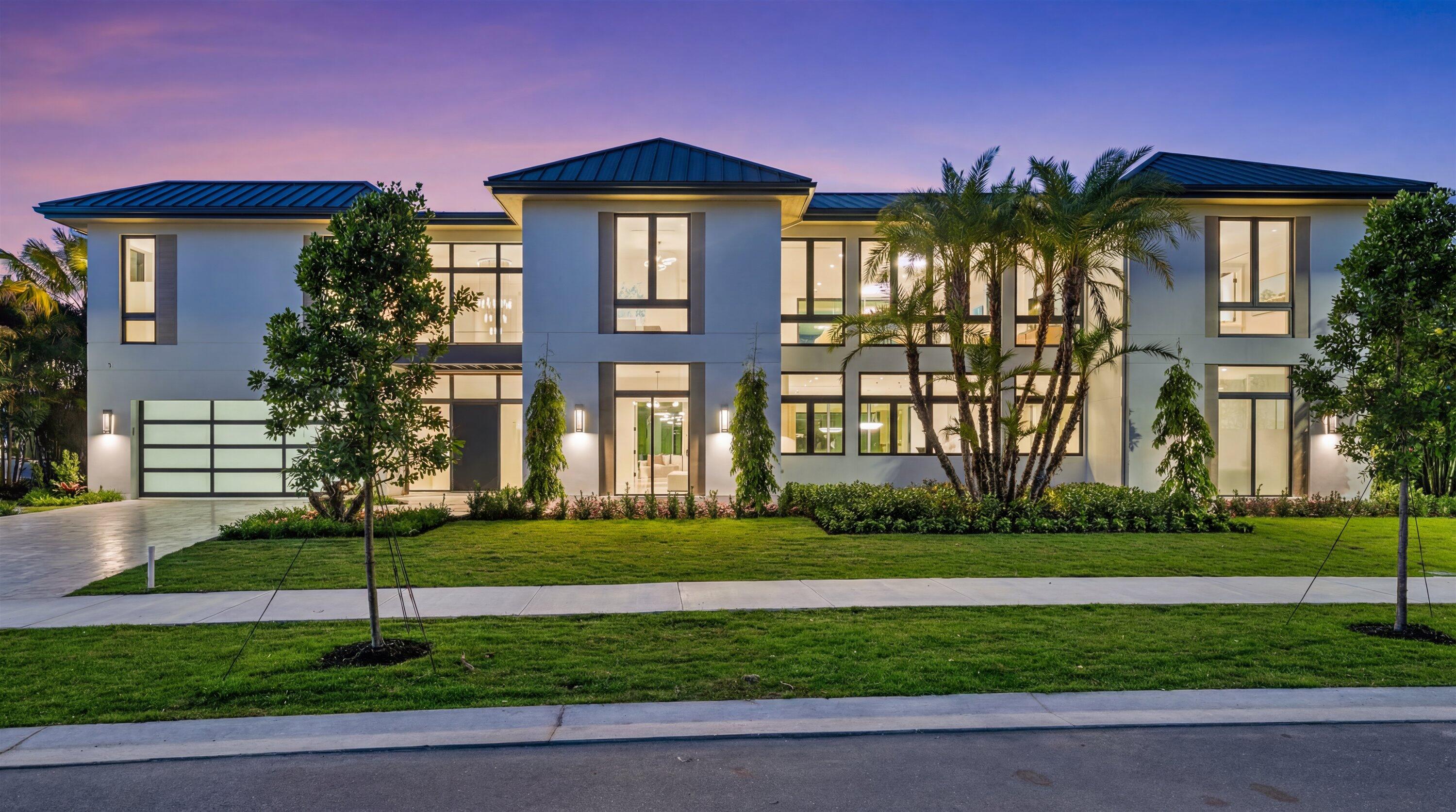 11368 Polo Park Trail Wellington, FL 33414 - Photo 1 of 33 a front view of a house with a yard
