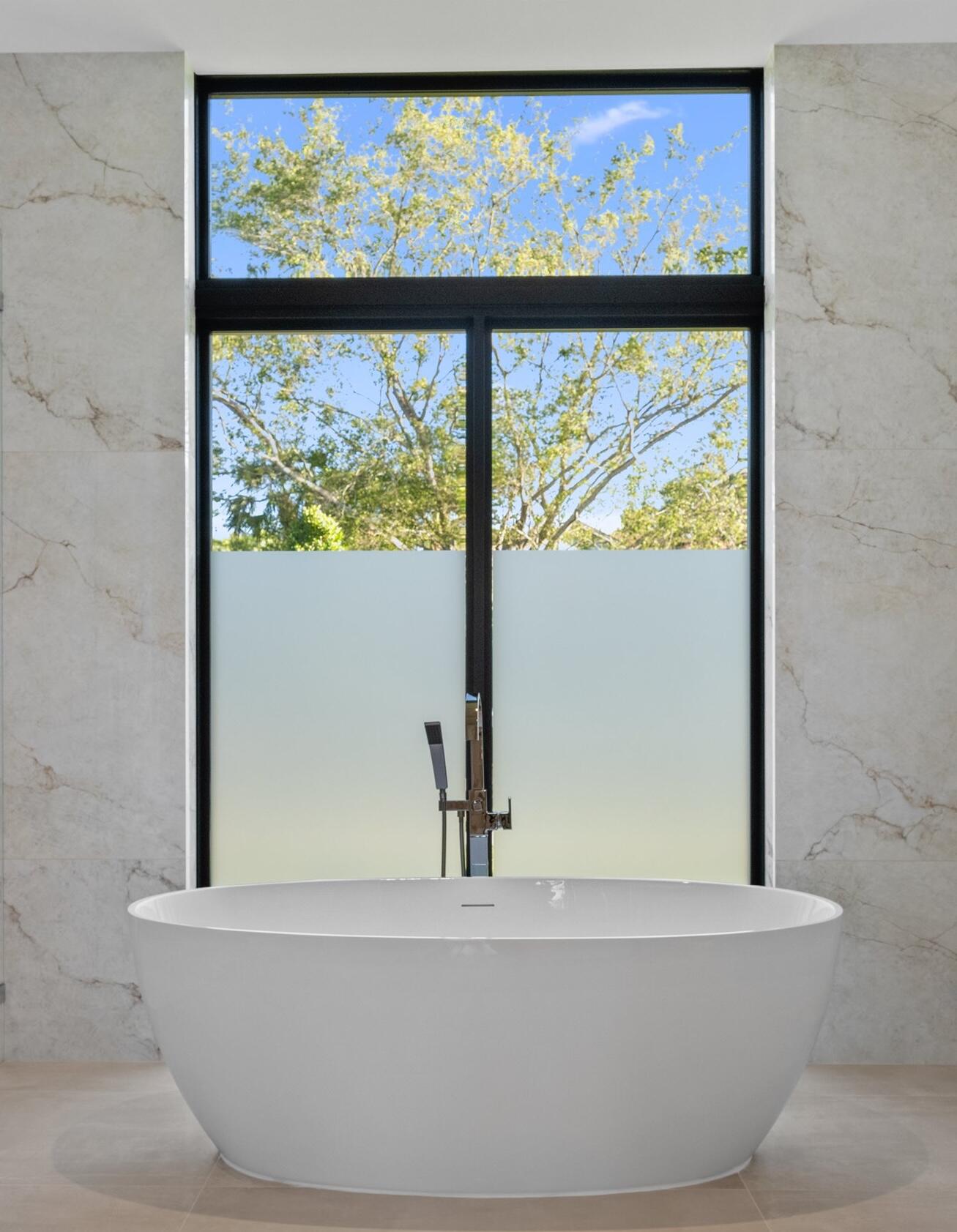 11368 Polo Park Trail Wellington, FL 33414 - Photo 12 of 33 a view of a large window with a small yard