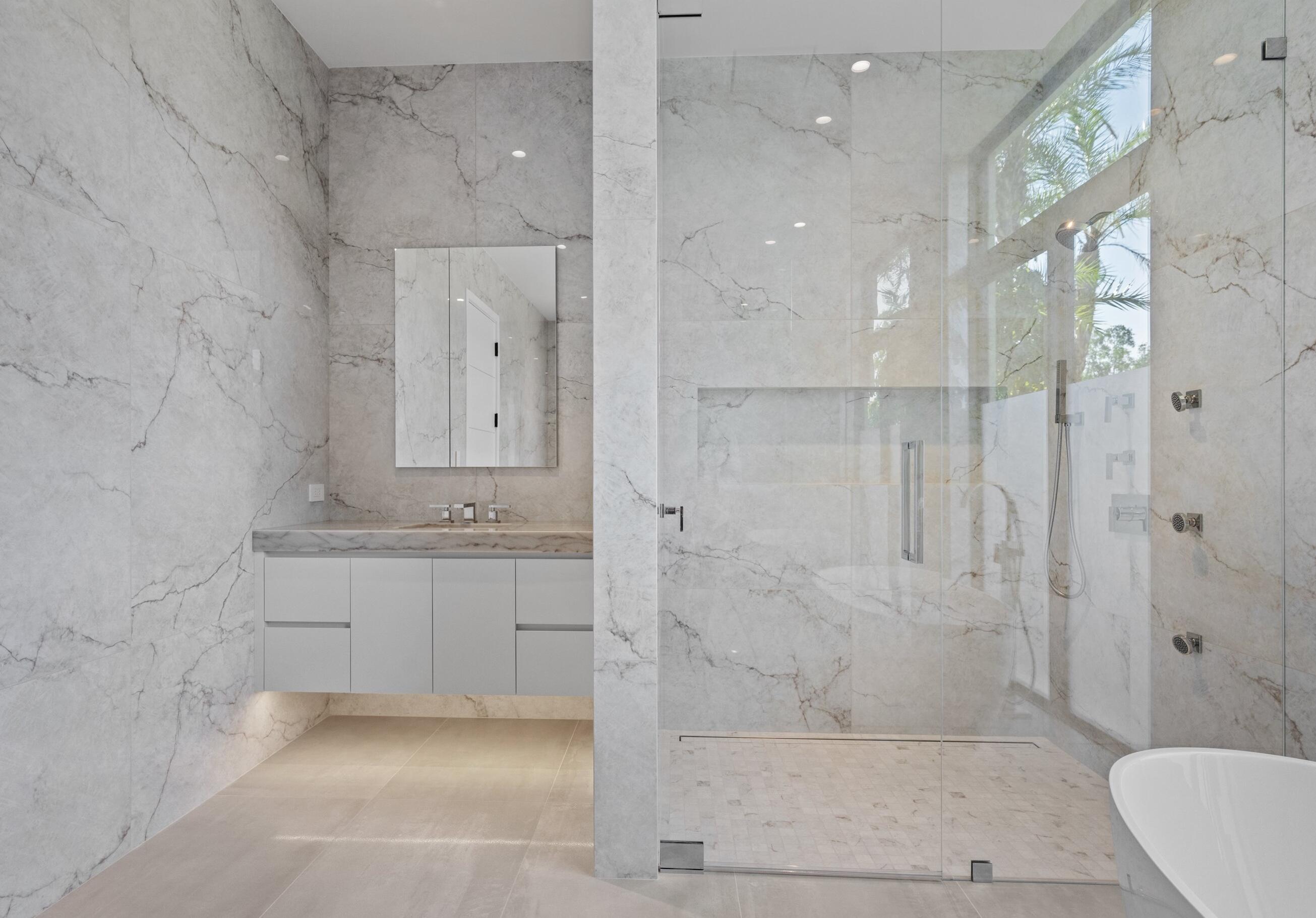 11368 Polo Park Trail Wellington, FL 33414 - Photo 13 of 33 a bathroom with a shower and a sink