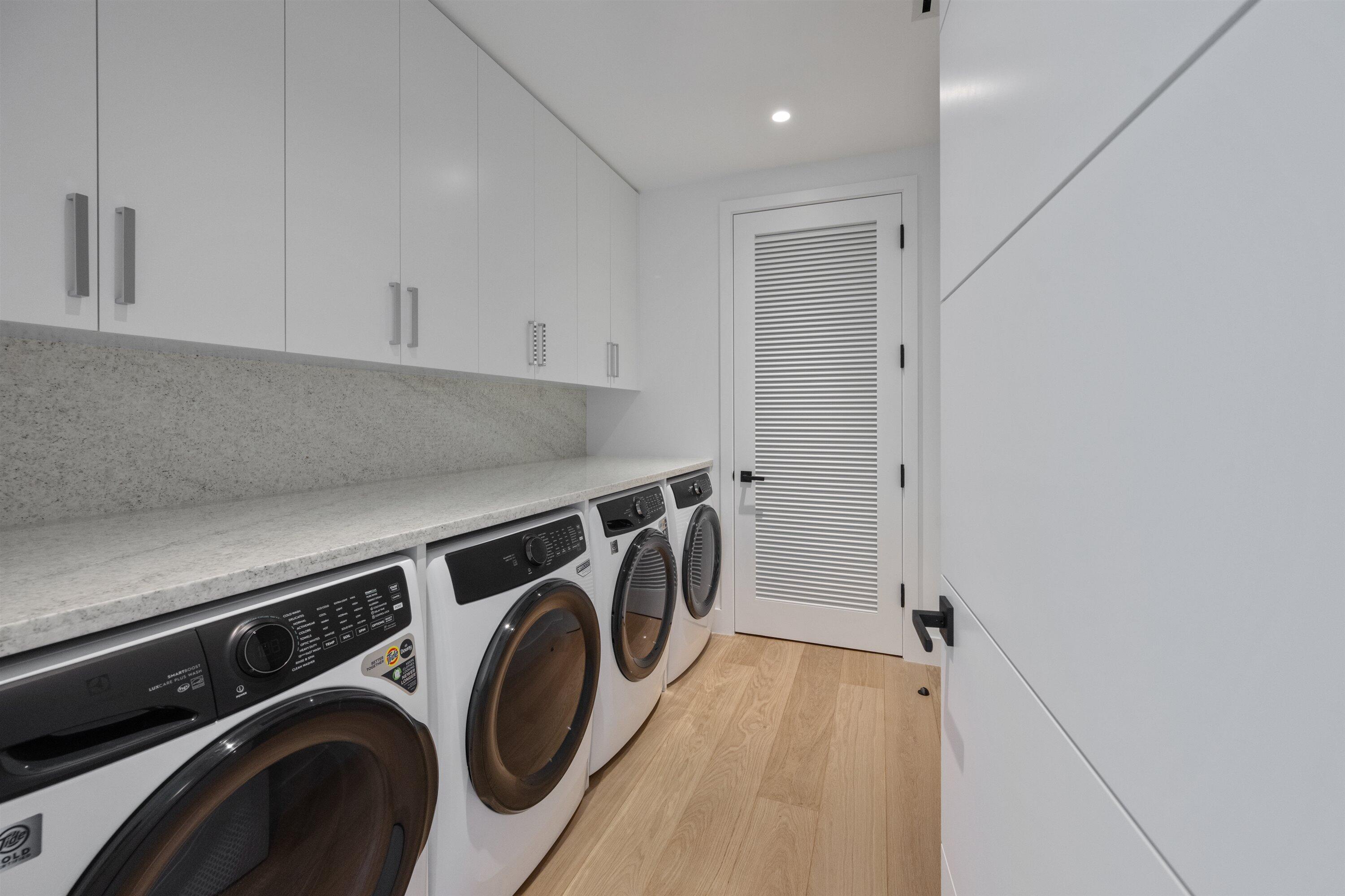 11368 Polo Park Trail Wellington, FL 33414 - Photo 14 of 33 a utility room with dryer and washer