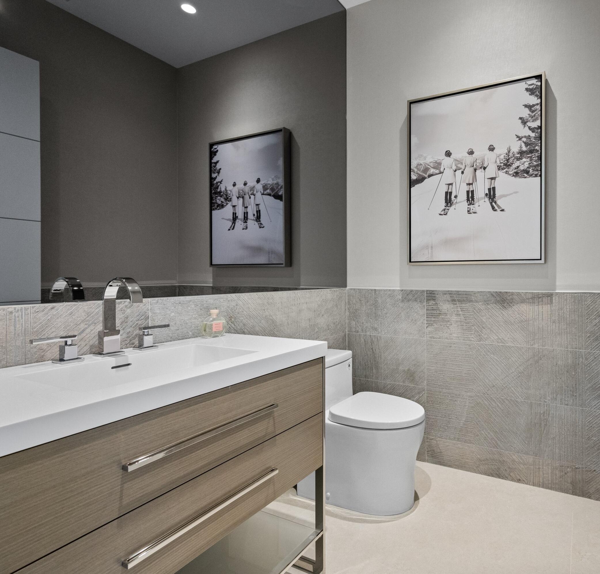11368 Polo Park Trail Wellington, FL 33414 - Photo 24 of 33 a bathroom with a toilet a sink and a mirror