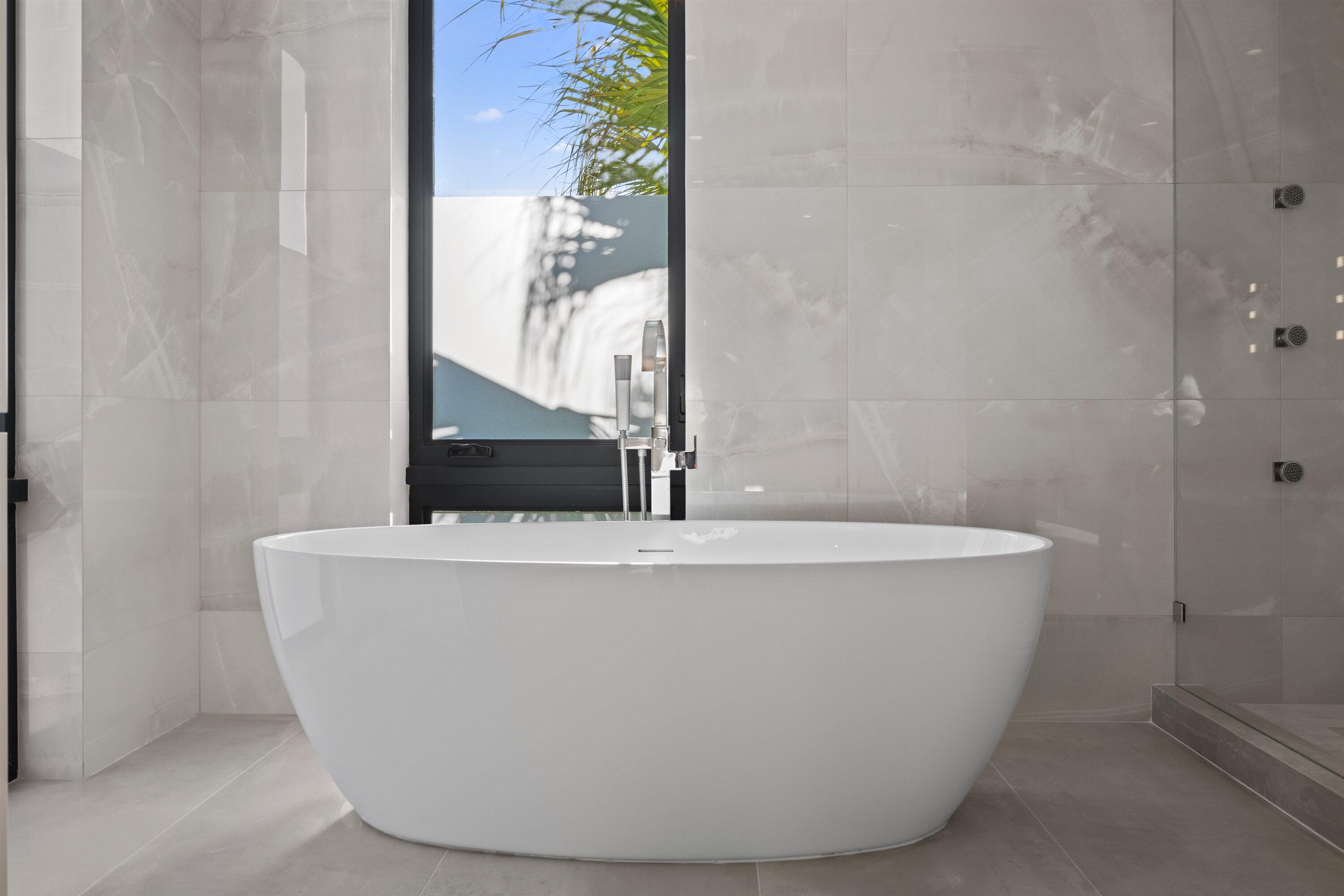11368 Polo Park Trail Wellington, FL 33414 - Photo 29 of 33 a view of a bathtub in a bathroom