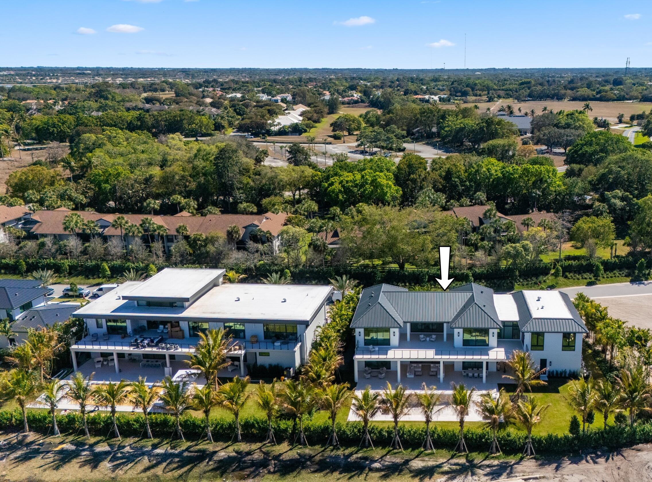 11368 Polo Park Trail Wellington, FL 33414 - Photo 33 of 33 an aerial view of a town with big trees