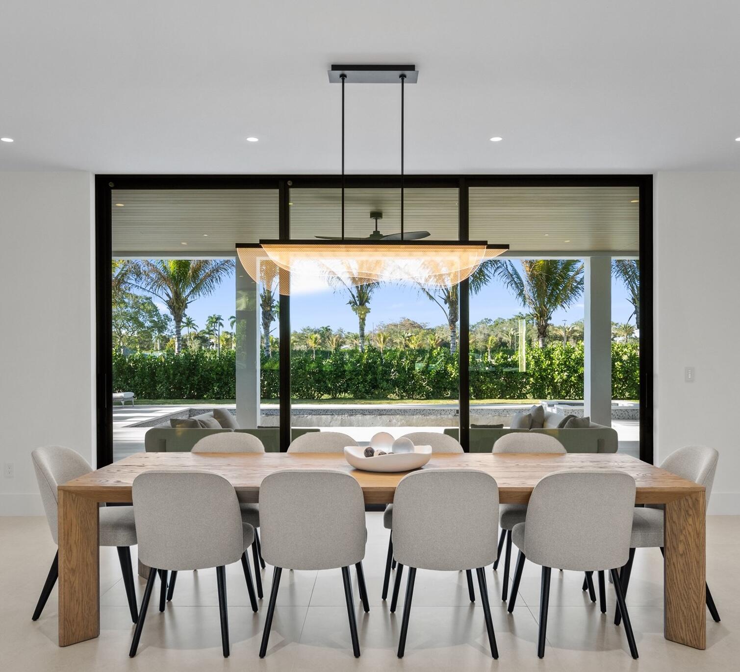 11368 Polo Park Trail Wellington, FL 33414 - Photo 10 of 33 a view of a dining room with furniture window and outside view