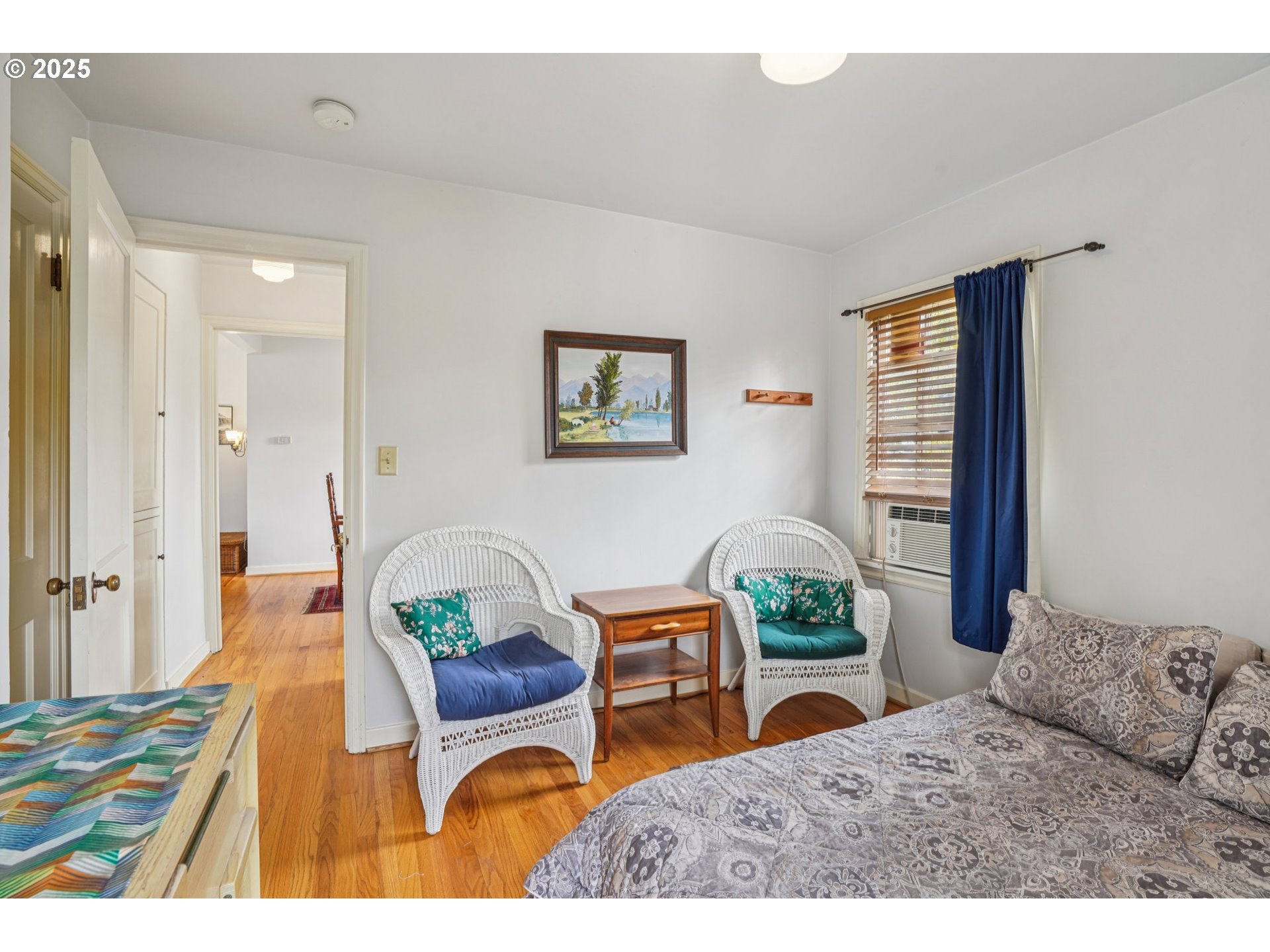 5400 Northeast 30th Avenue, Unit 304 Portland, OR 97211 - Photo 12 of 15 a bedroom with a bed and a table in it
