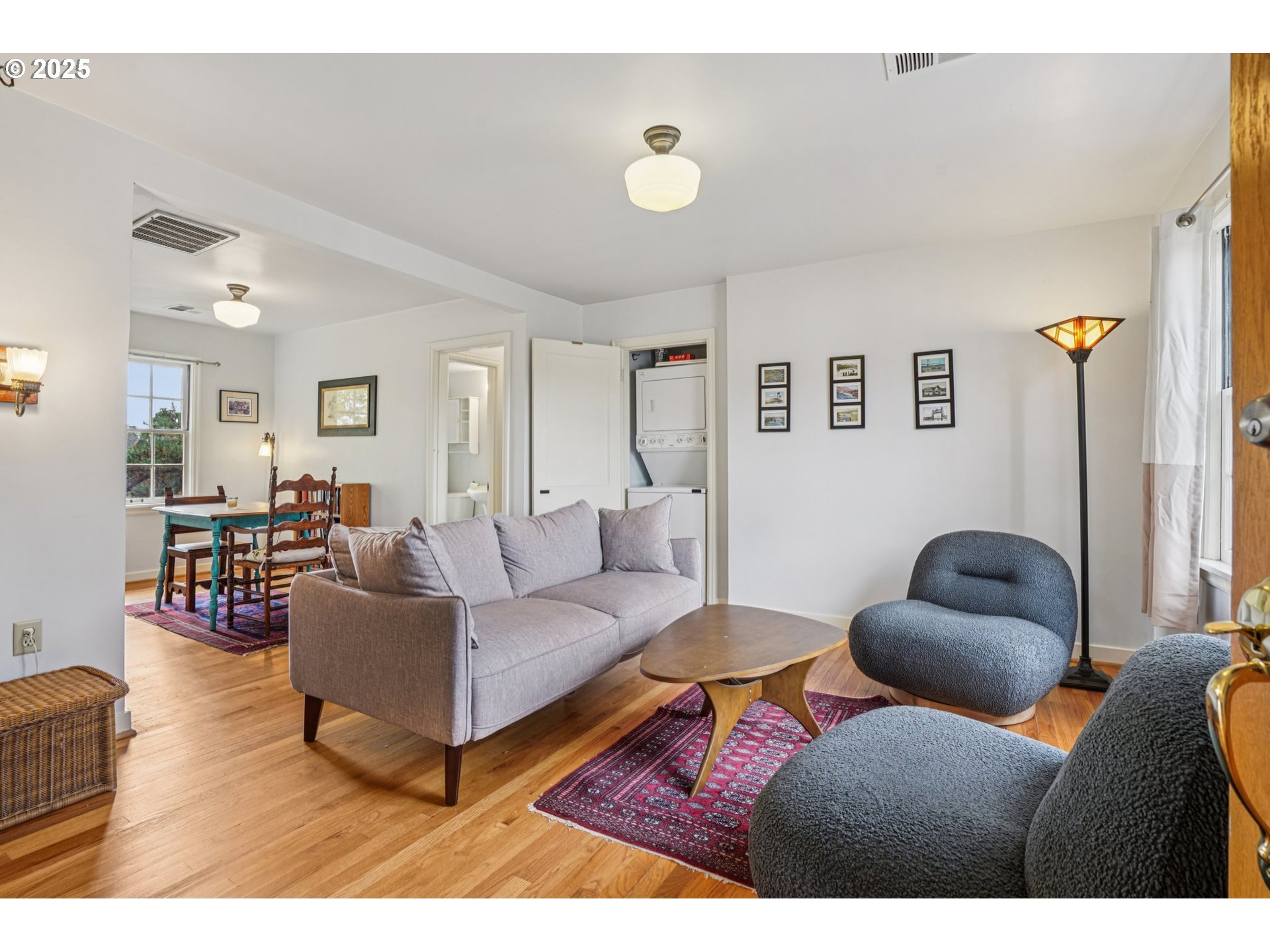 5400 Northeast 30th Avenue, Unit 304 Portland, OR 97211 - Photo 3 of 15 a living room with furniture and a couch