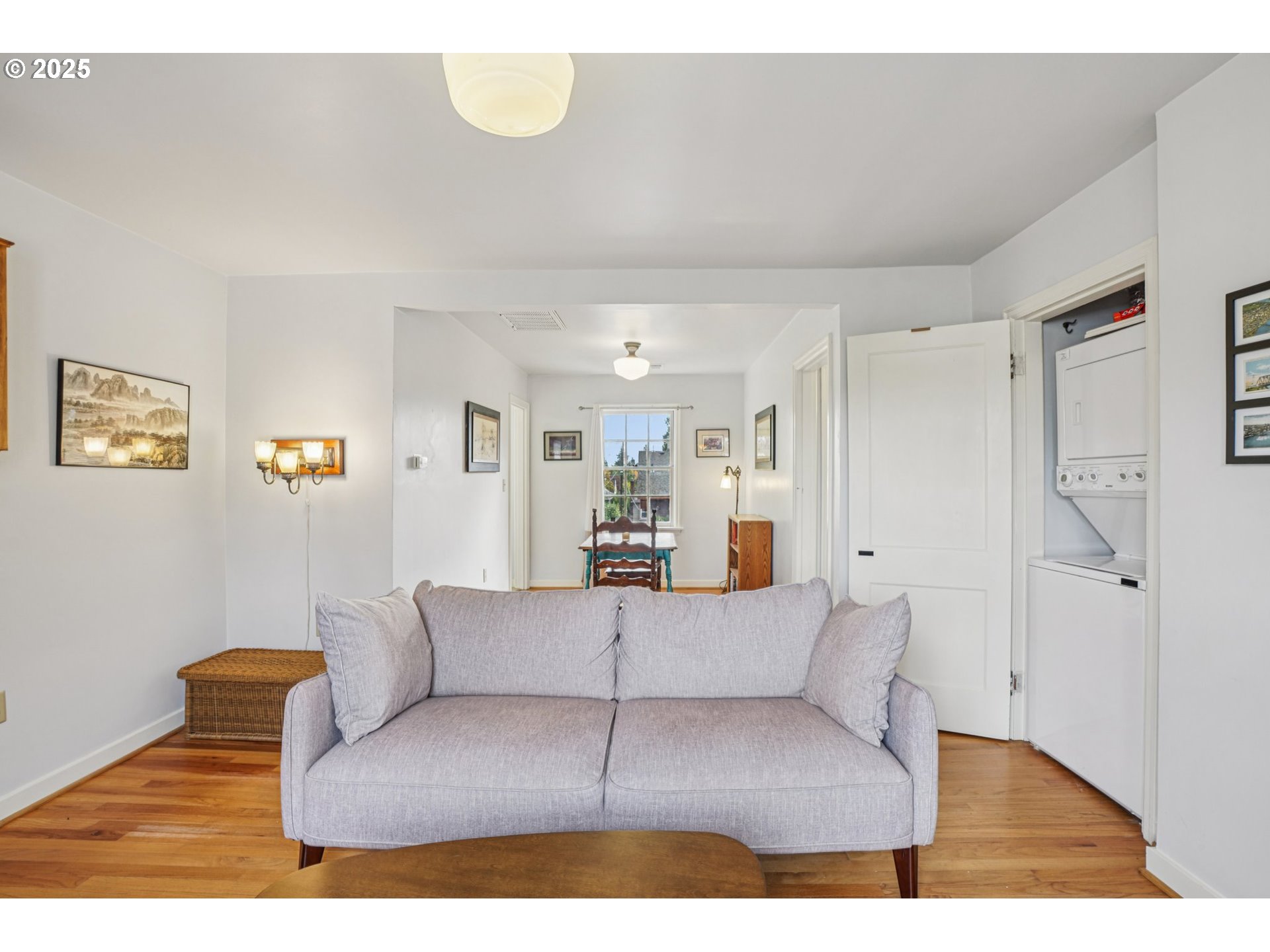5400 Northeast 30th Avenue, Unit 304 Portland, OR 97211 - Photo 6 of 15 a living room with furniture and a wooden floor
