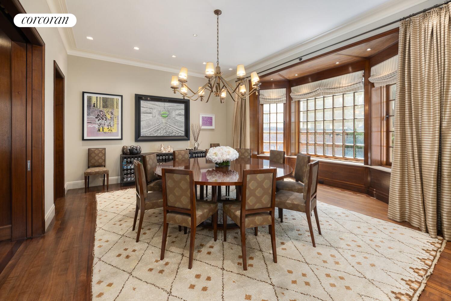 4 East 73rd Street Manhattan, NY 10021 - Photo 13 of 32 a view of a a dining room with furniture window and wooden floor