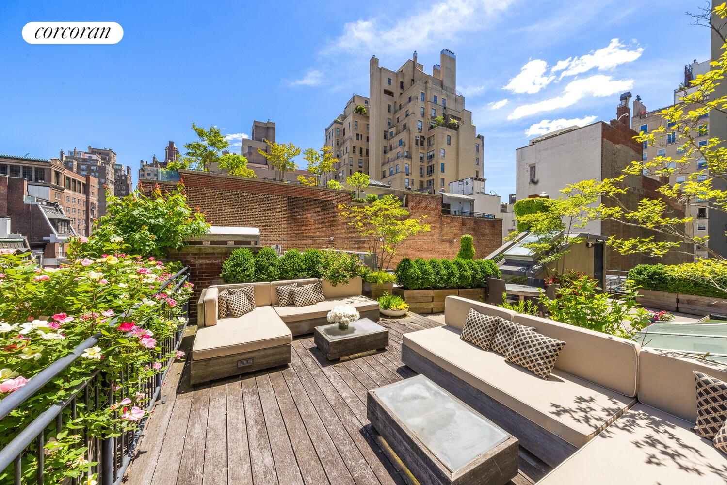 4 East 73rd Street Manhattan, NY 10021 - Photo 28 of 32 a view of a balcony with chairs and a table