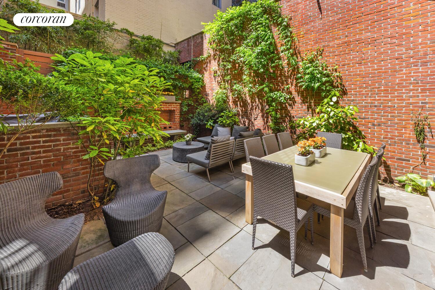 4 East 73rd Street Manhattan, NY 10021 - Photo 7 of 32 a view of a porch with furniture and a yard