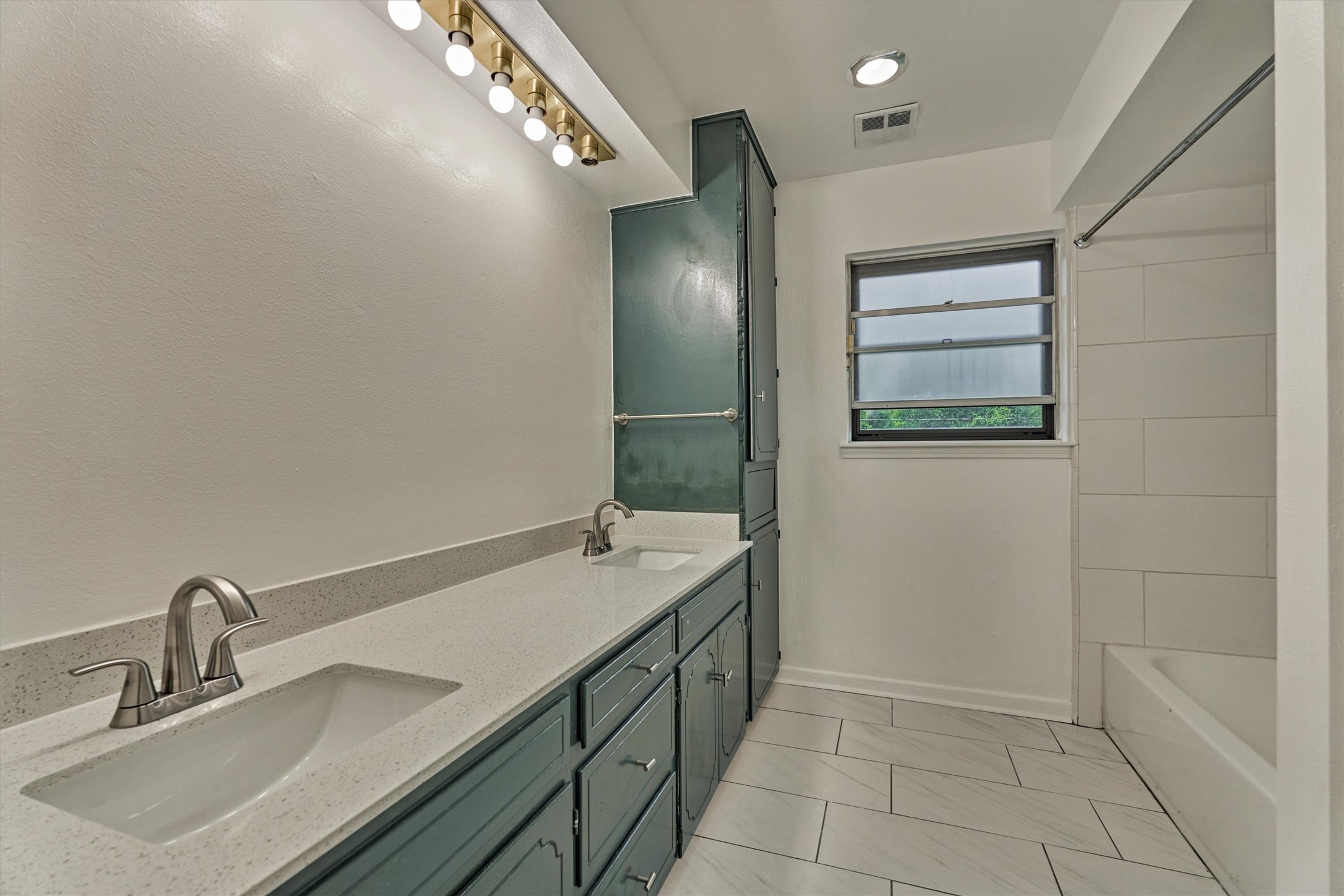 19426 Whitewood Drive Spring, TX 77373 - Photo 26 of 41 Secondary Bath Dual sink vanity. Tub and Shower