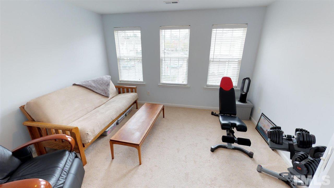 5233 Moonview Court Raleigh, NC 27606 - Photo 13 of 25 A second suite with attached full bathroom offers many potentials