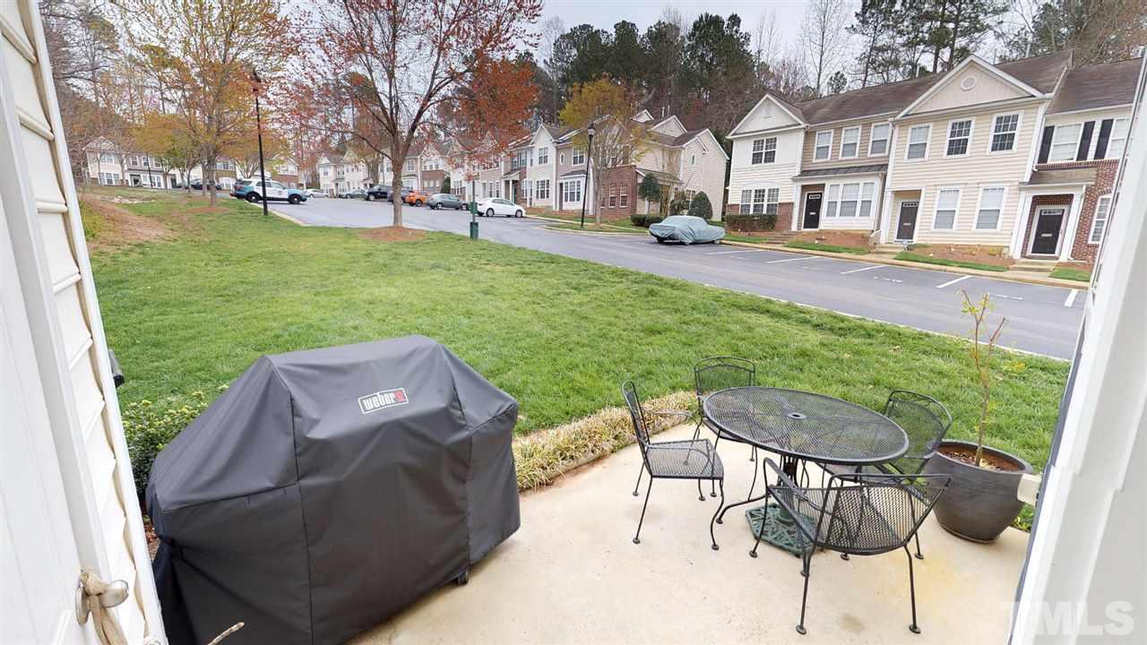 5233 Moonview Court Raleigh, NC 27606 - Photo 22 of 25 Enjoy your leisure time on the rear patio, great walking or jogging neighborhood